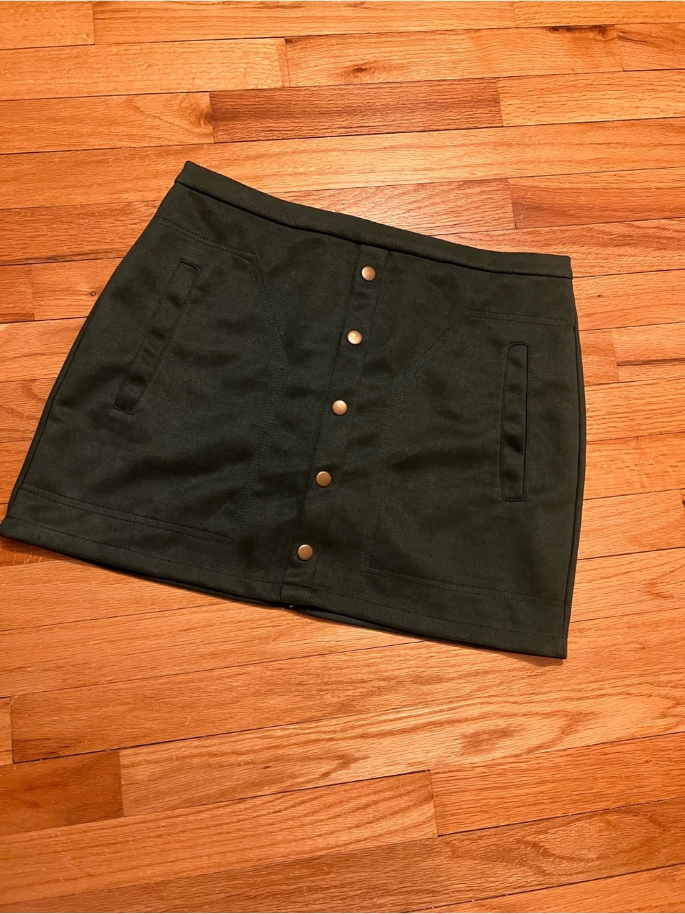 Deep green suede mini skirt